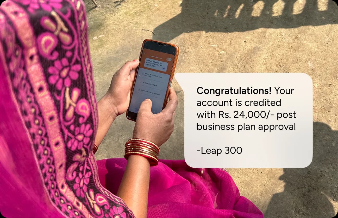 Beneficiary receiving grant notification on phone